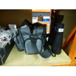 A pair of binoculars by the National Geographic 36X - 108AP X70 zoom, along with a bagged Canon