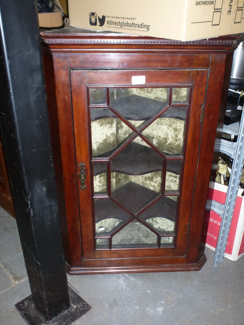 Victorian mahogany hanging corner cupboard with glazed doors.