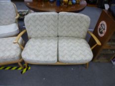 An Ercol stickback two seat settee, with open armchair and stool