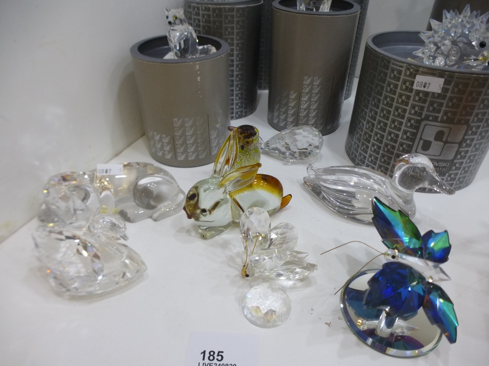 A quantity of Swarovski animal figures, some boxed, etc