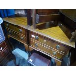 A pair of reproduction mahogany two drawer bedside tables