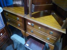 A pair of reproduction mahogany two drawer bedside tables