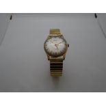 A vintage gents Everite 17 Jewels 9ct gold wrist watch with expanding bracelet, not gold