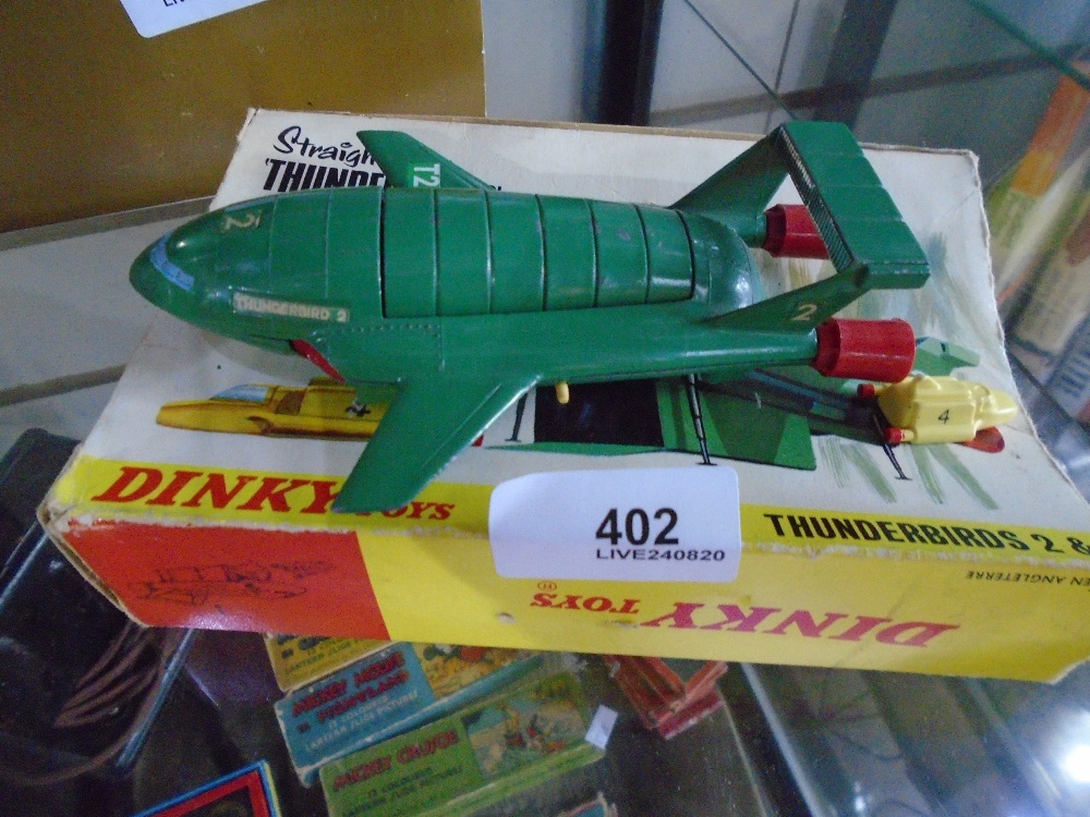 A 1960s Dinky Thunderbirds 2 & 4, with a part box
