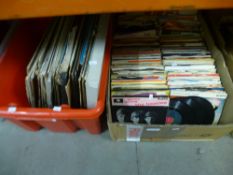 A box of vinyl LPs and a box of 7" vinyls covering 60s and 70s Rock and Pop to include The Beeles,
