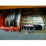 A box of vinyl LPs and a box of 7" vinyls covering 60s and 70s Rock and Pop to include The Beeles,