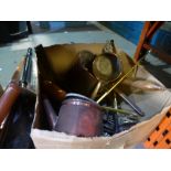 A box of brass and copper items to include bed warmer, fry pan, teapot, horse brasses, etc