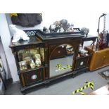 A 19th Century ebonised ormolu mounted credenza with Wedgwood plaques to the outer doors and a