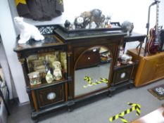 A 19th Century ebonised ormolu mounted credenza with Wedgwood plaques to the outer doors and a