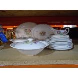 A quantity of Susie Cooper tableware - Parrot Tulip design including gravy boat, serving dishes with