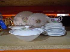 A quantity of Susie Cooper tableware - Parrot Tulip design including gravy boat, serving dishes with