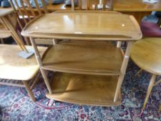 An Ercol three tier tea trolley