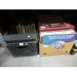 Red carry case and DJ box of vinyl 12" singles including Coolio, Prodigy