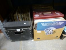 Red carry case and DJ box of vinyl 12" singles including Coolio, Prodigy