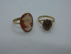 9ct yellow gold dress ring size Q, with large smokey topaz, marked 375 together with 9ct yellow gold