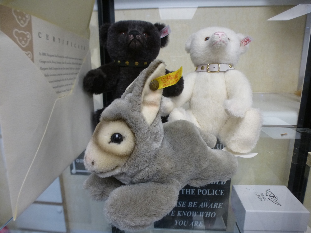 Two Steiff teddy bears and a Steiff mini floppy rabbit