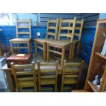 A set of beech slat back dining chairs