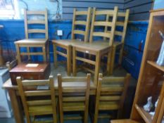 A set of beech slat back dining chairs