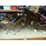 A quantity of horse figurines some being Beswick, etc