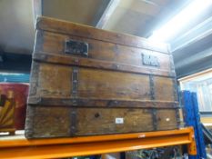 A metal edged dome top trunk