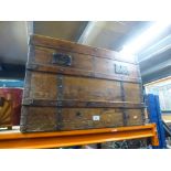 A metal edged dome top trunk