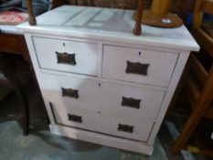 A small painted chest of drawers