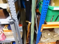 A quantity of fishing rods, and accessories, etc