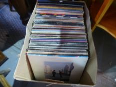 A box of vinyl LPs to include Spandau Ballet, George Michael, Queen, Mostly Blues