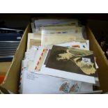 A box of mixed World covers and postcards