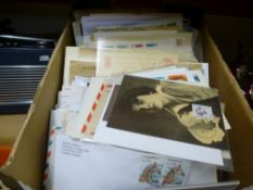 A box of mixed World covers and postcards