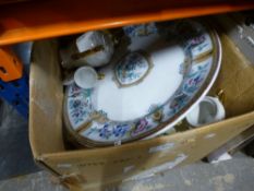 A box of mixed china to include a large platter, cups, coffee pot, ginger jar etc.