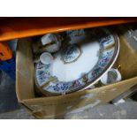 A box of mixed china to include a large platter, cups, coffee pot, ginger jar etc.