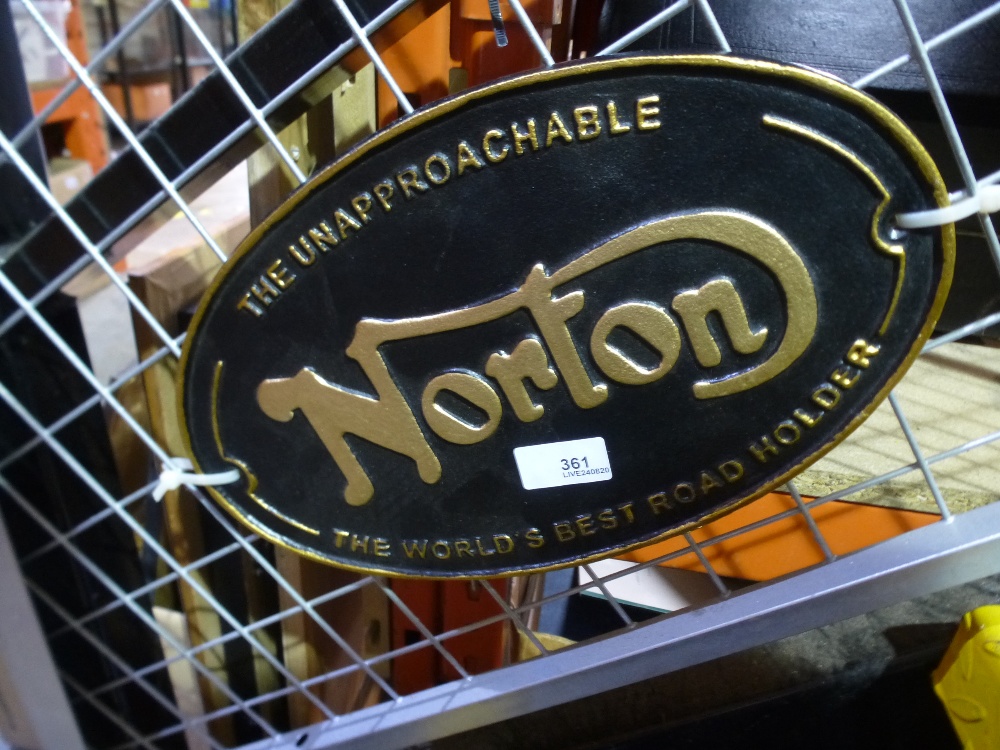 Black and gold Norton sign