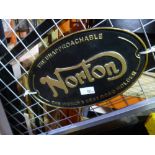 Black and gold Norton sign