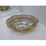 A silver pierced decorative bowl with foliage design rim marked Birmingham 1920 S. Blanekensee and
