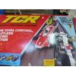 A boxed total controlled racing system which includes 29ft of slotless track, two jam cars and two