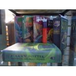 Six hardback Harry Potter books, four being American First Editions, and two English First Editions.