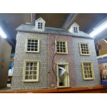 Modern dolls house and books