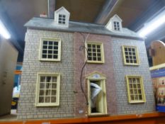 Modern dolls house and books