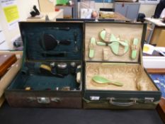 An old leather travelling case having fitted interior with three silver topped bottles and one other