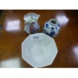 A Chinese octagonal tea bowl decorated flowers and two other items