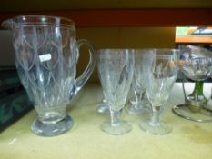 A set of 6 etched wine glasses with jug