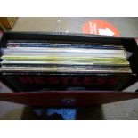 A carry case of 80s and 90s Psychobilly Rock vinyl LPs