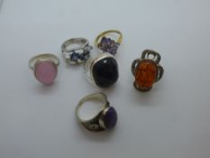 Collection of silver and other dress rings, including Amber, Jet examples