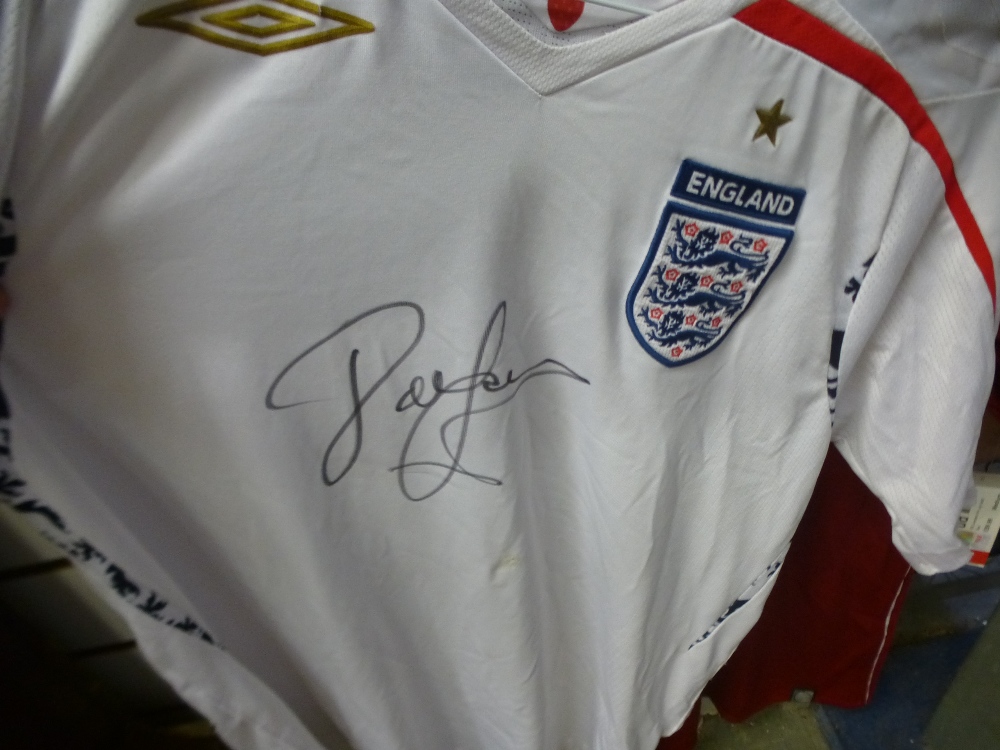 A signed 2007-2009 England shirt by John Barnes, together with a Liverpool shirt signed by John - Image 2 of 3