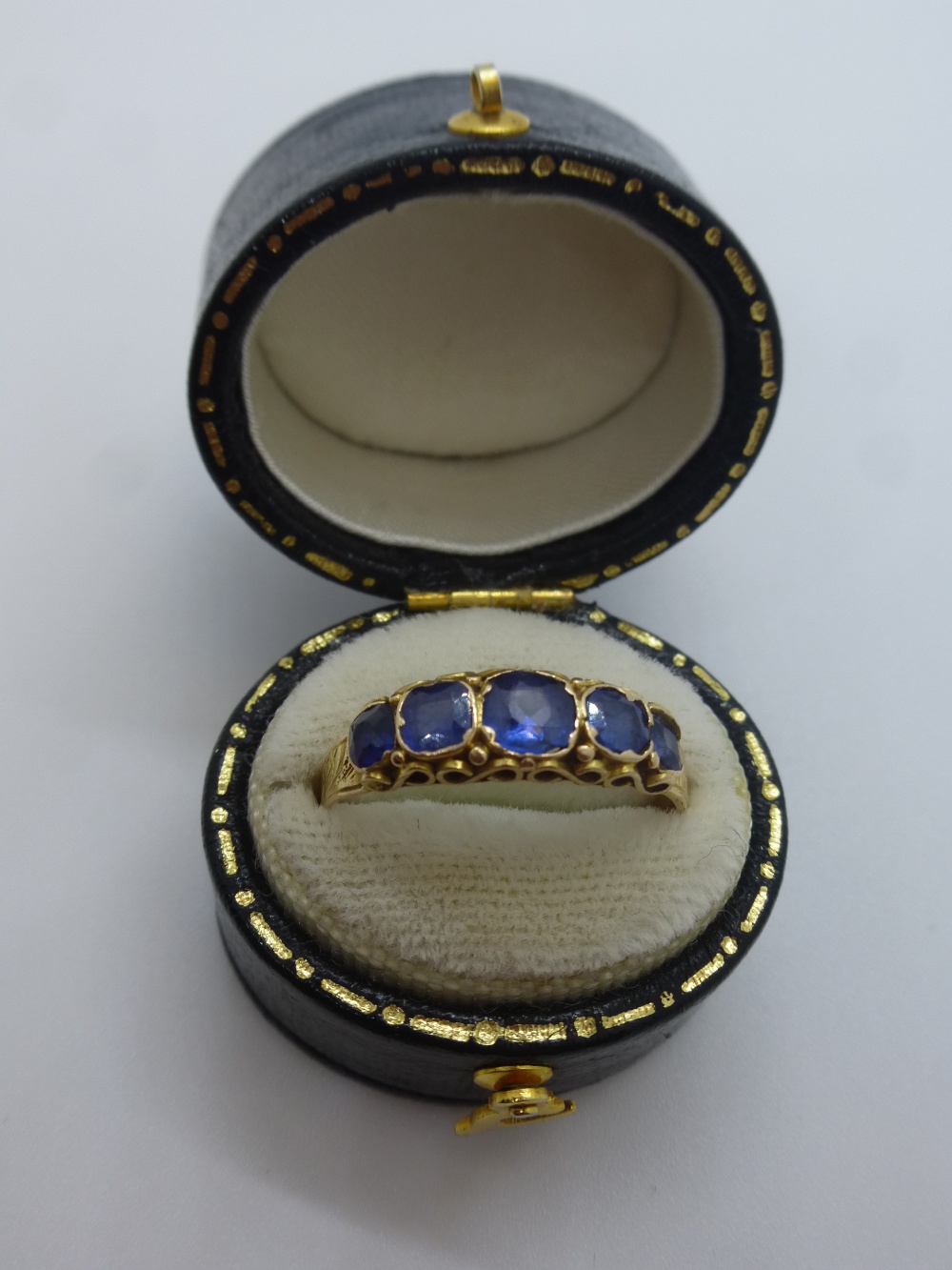 Victorian yellow metal ring, tests as 18ct, set with 5 sapphires, size R/S, weight approx 2g