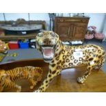 A Beswick Tiger, a similar smaller example and an Italian pottery Leopard by Favaro Cecchetto
