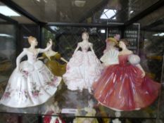 Four Royal Doulton figures of ladies and a similar limited edition Worcester figure - 5