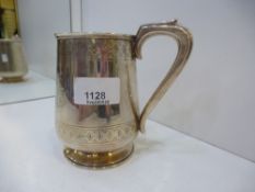 A white metal, possibly continental, tankard of decorative engraving weight approx 9.07ozt