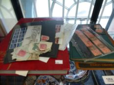 Three stamp albums and other loose stamps